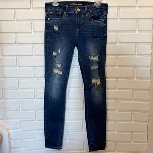 Express Dark Distressed Mid Rise Jegging Size 2R